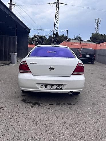 klas 6: Nissan Sunny: 1.6 l | 2007 il Sedan — 6