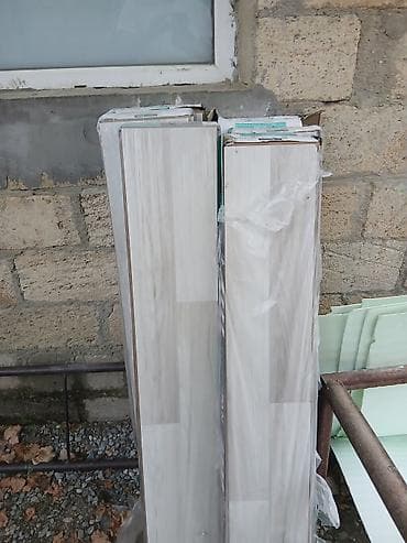 Məhsul: Laminat döşəmə taxtaları Yenidir istifade olunmayib.13kv — 2