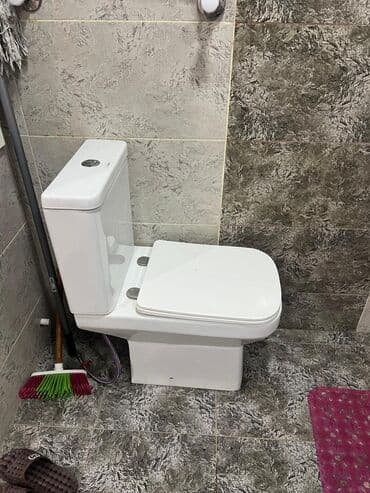 unitaz qiymətləri: Ağ rəngli unitaz, müasir dizaynı ilə hər bir vanna otağına uyğunlaşa — 2