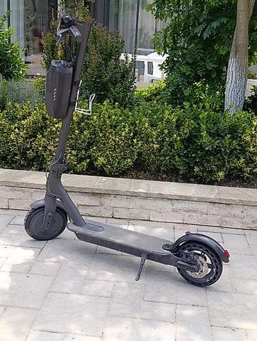 Elektrikli skuter – şık boz dizayn - Geniş və sürüşməyən gövdə