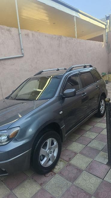 barter disk: Mitsubishi Outlander – boz rəngli, universallığı və rahatlığı ilə — 3