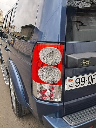 4 qapi niva: Land Rover Discovery 3 – tünd mavi rəng, tam ölçülü SUV. Əsas — 1