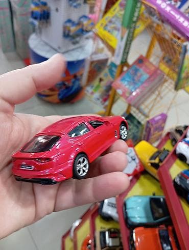 İdman və hobbi: Miqyaslı metal oyuncaq avtomobil – qırmızı rəngdə sport sedan modeli — 2