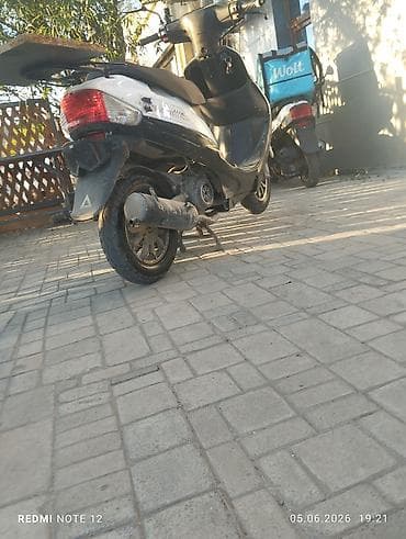 moto ehtiyat hiseleri: Skuter – 50cc sinif (təxmini), şəhər içi gediş-gəliş və çatdırılma — 1