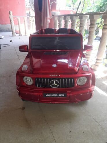 masin ucun xor xor: Mercedes G-Class (AMG üslubunda), qırmızı rəng. Xüsusiyyətlər: - — 1
