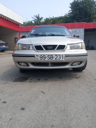 купить чехлы на авто: Model: Daewoo Nexia sedan Kuzov: 4 qapılı, gümüşü rəng — 1