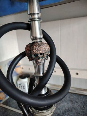 işlənmiş qəlyan: Metalik gövdəli nərgilə – kəllə fiqurlu dekorla - Materiallar — 1