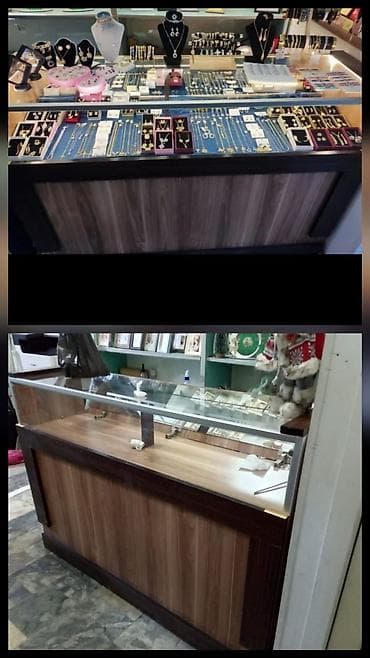 Vitrin satılir 100azn Uzunu 1.50 Eni 40 Hündürlük 1metr Unvan