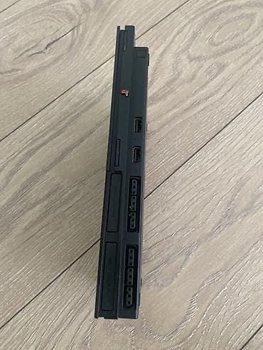 ps1 disk: Sony PlayStation 2 Slim (PS2) oyun konsolu seti Xüsusiyyətlər: - — 4