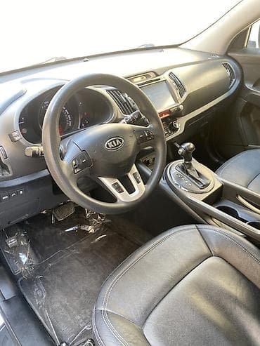 doogee dg550 dagger: Kia Sportage: 2 l | 2010 il Krossover — 9