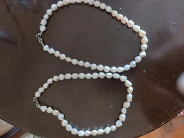 1 qram ağ qızılın qiyməti: Tebii mirvari satilir,bir boyunbaqi 100 m,ikisi 200 m — 2