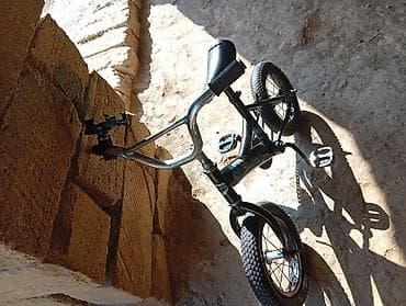 usaq oyuncaqlari type 1 per page 40: Uşaq velosipedi – kiçik ölçülü BMX üslubunda model. Xüsusiyyətlər: - — 1