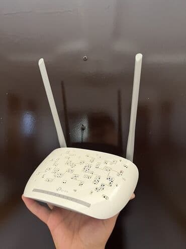 Tp Link modem. Tam işlekdir. Az işlenib. Şunur ve kabelleri var