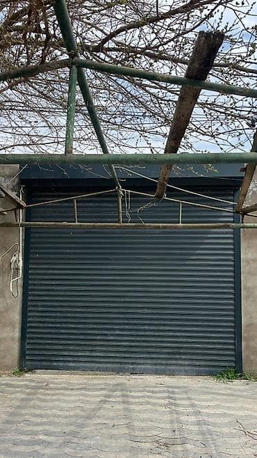 Metal jalüz qapı - Tip: Yuxarıdan yığılan metal jalüz (rollet) qapı -