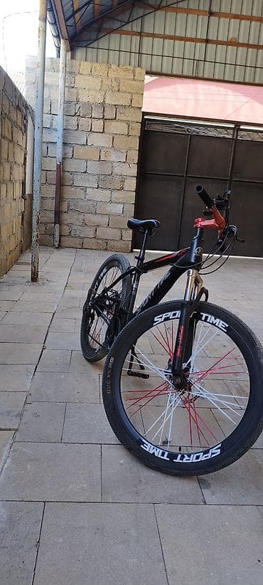 velosiped a: Sport Time dağ velosipedi zəng eləmə tek vasssap real alıcıya endirim — 2