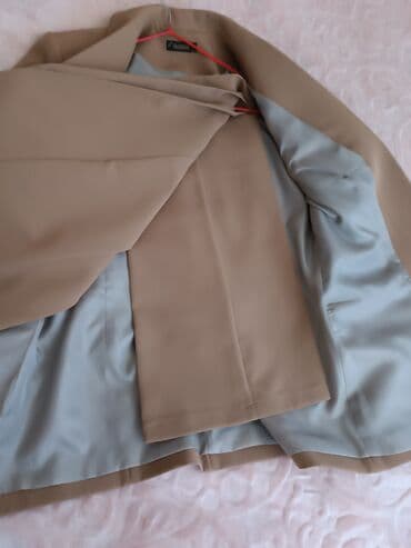 kostyum qadin ucun: Razmeri uyğun gəlmədiyi üçün satılır.50 azn — 3