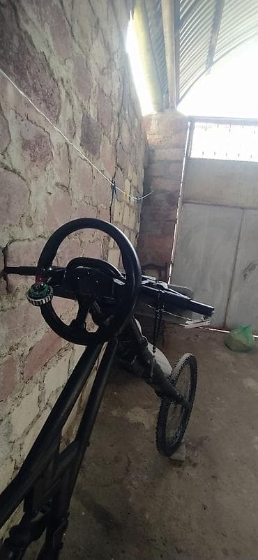 elektrikli scooter motor: Ön təkəri böyük, arxa hissəsi xüsusi konstruksiyalı — 1