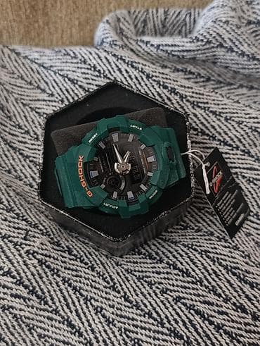 Aksesuarlar: Casio G‑Shock GA‑700SC (3A) – yaşıl rəngli idman saatı. Heç istifadə — 3