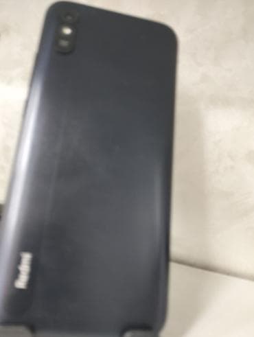 32: Redmi 9A, 32 GB, rəng - Qara, Zəmanət — 1