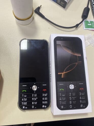 knopkalı: Salam telfon həm sensın həmdə Knopkayla işləyir təzədir 2sim kartdı — 2