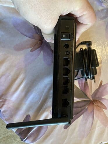 tp link modem qiymeti: Upvel şirkətindən olan qara rəngli router. Evdə və ya ofisdə internetə — 4