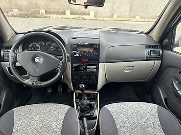 şam diskilər: Fiat Albea sedan - Kuzov: 4 qapılı sedan, bej rəng (bəzı hissələrdə — 7