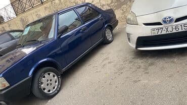 tofaş satış: Model: Tofas Şahin (sedan) Kuzov: 4 qapı, mavi rəng Yanacaq: Benzin — 2