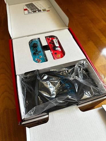 video dvd: Nintendo Switch OLED (neon mavi/qırmızı Joy‑Con) + Batman: Arkham — 4