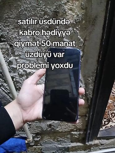 Redmi smartfon - Rəng: mavi-bənövşəyi arxa qapaq - Ekran: damla-notch
