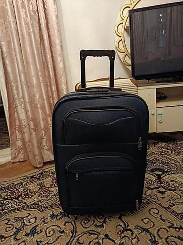 islenmis camadan: Təkərli əl yükü/orta ölçülü tekstil çamadan Uzunluq 60 sm En 40 sm — 1
