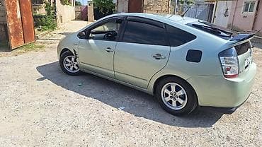 sam diskiler: Toyota Prius (2-ci nəsil) hibrid hetçbek Polnu Full maşındı. SAAT — 5