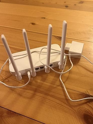 rutor modem: Xiaomi Mi Wi‑Fi Router (ağ rəngli, 4 antenalı) Xüsusiyyətlər: - 4 — 2