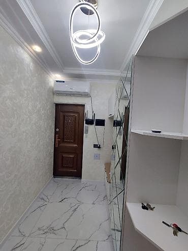 Bakıxanovda Aygün malla üzbə üz 9 mərtəbəli binanın 7 ci mərtəbəsində