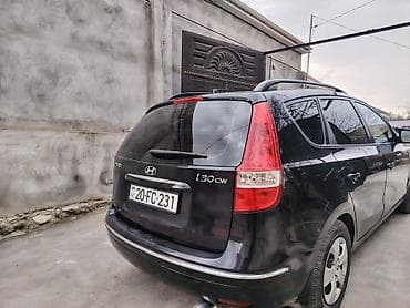 Продажа авто: Hyundai i30 CW, qara rəngli universal kuzov. Xüsusiyyətlər: - Kuzov — 7