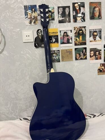 Qarmonlar: Məhsul: Akustik gitar 1 aydi alinib Tezedi 1 2 defe istifade olunub — 3