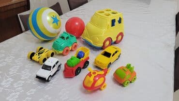 машины для детей: Fərqli ölçülü və formalı uşaq oyuncaqlarından ibarət dəst. Dəstdə sarı — 1