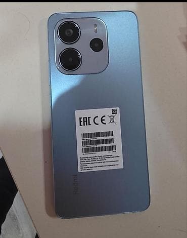 Redmi smartfon not14 idiyal ciziqsiz barterde var yalniz iphone