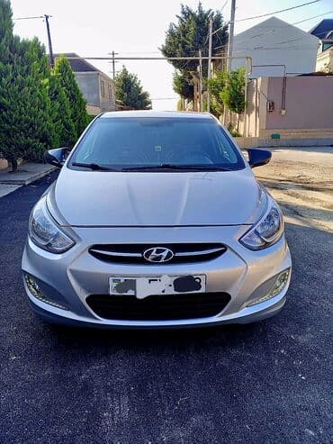 kia sportage 2006: Hyundai Accent: 1.4 l | 2016 il Sedan — 1