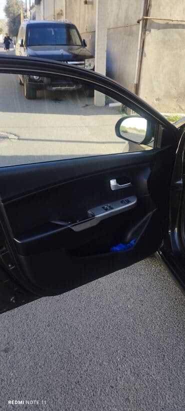 maşın 09: Kia Rio sedan - Korpus: 4 qapılı sedan, tünd qəhvəyi rəng - Kuzov — 10