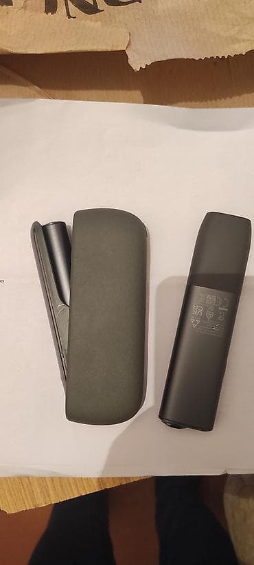 krem a e: IQOS elektron tütünqızdırma cihazı dəsti Xüsusiyyətlər: - Rəng: tünd — 2