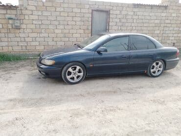 sumqayit opel oluxana: Model: Opel Omega sedan Kuzov: 4 qapı, tünd mavi rəng Nömrə — 3