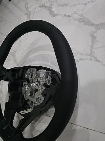sukan lada: Avtomobil sükan çarxı - Material: Qara dəri üzlüklü sükan (tikişli) — 2