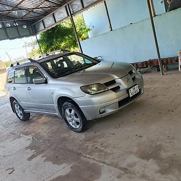 vuruq masin: Mitsubishi Outlander: 2.4 l | 2002 il 315594 km Krossover — 3