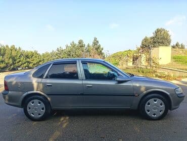 Çəngəllər: Opel Vectra: 1.8 l | 1996 il 193000 km Sedan — 15