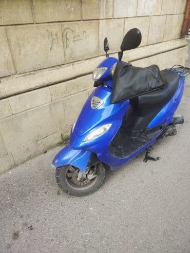 Motosikletlər: Məhsul: Şəhər içi istifadə üçün moped/skuter Xüsusiyyətlər: - Rəng — 2