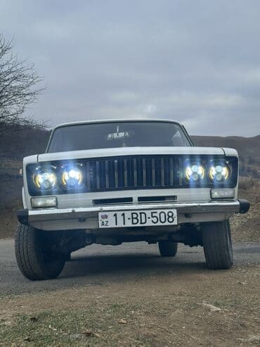 фольксваген поло комплектации и цены: QAZ-24 “Volqa” avtomobili - Kuzov: sedan, klassik dizayn, ağ rəng - — 1