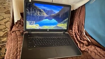 2 ci el notebook: HP noutbuk - Korpus: gümüşü qapaq, HP loqosu; qara klaviatura sahəsi — 2