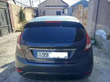 hyundai accent 2002 model: Ford Fiesta hatchback Xüsusiyyətlər: - Kuzov: 5 qapılı hatchback — 3