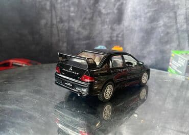 maşın modeli: Коллекционная модель Mitsubishi Lancer Evolution VII black 2002 — 7