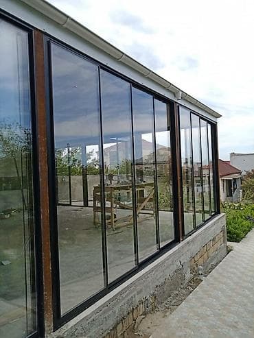 Şüşəli sürüşmə sistemləri sayəsində açıq sahələri qapalı yaşayış lalafo.az -da Şüşəli sürüşmə sistemləri sayəsində açıq sahələri qapalı yaşayış